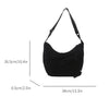 Black leopard print crossbody bag shown from the side with dimensions 34cm long and 6.5cm wide.