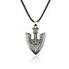 Silver anchor pendant necklace featuring a stylized anchor design