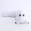 A white plush toy shaped like a witch hat with large black eyes and a long body.