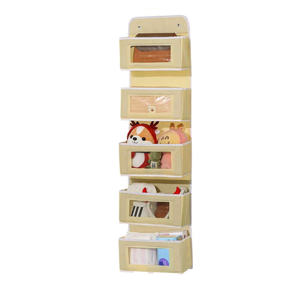 A vertical organizer with multiple compartments for hanging items, featuring various colored fabric and plastic organizers.