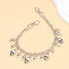 Silver metal bag chain strap featuring skull charms for handbags and purses