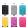 A set of colorful stretchable luggage covers in black, gray, yellow, and pink with zipper closures.