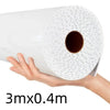 Roll of white 3D marble peel-and-stick waterproof wall panels being held by a hand