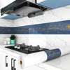 A roll of self-adhesive kitchen splashback sticker in white and blue for decorating