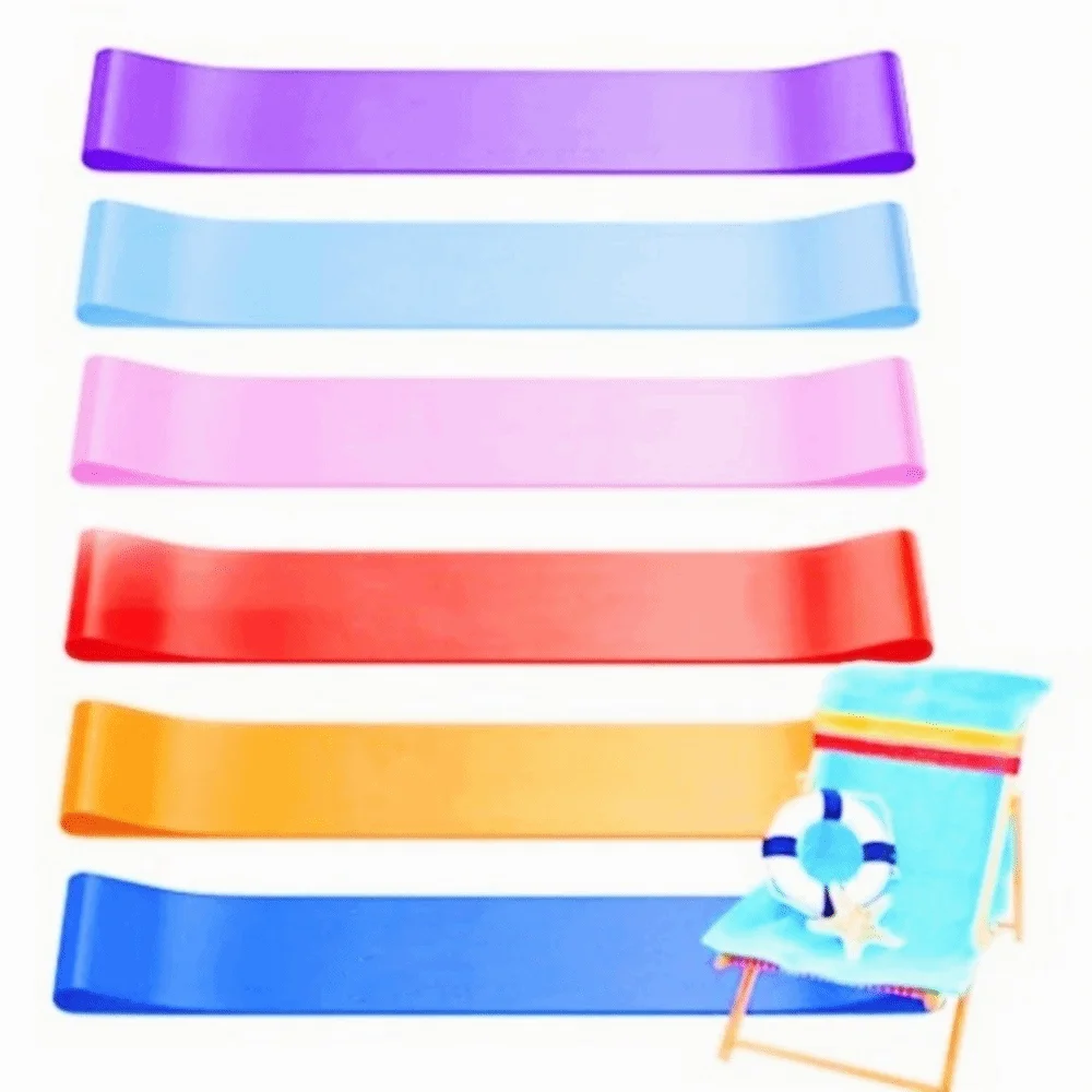 Un juego de cuatro bandas de silicona de colores usadas como clips para toallas de playa a prueba de viento.