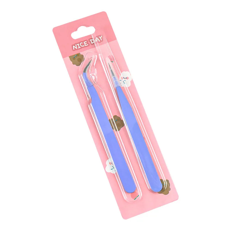 A set of macaron color craft tweezers for scrapbooking and journaling packaged in pink.