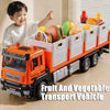 An orange and white diecast truck model transporting various fruits and vegetables.