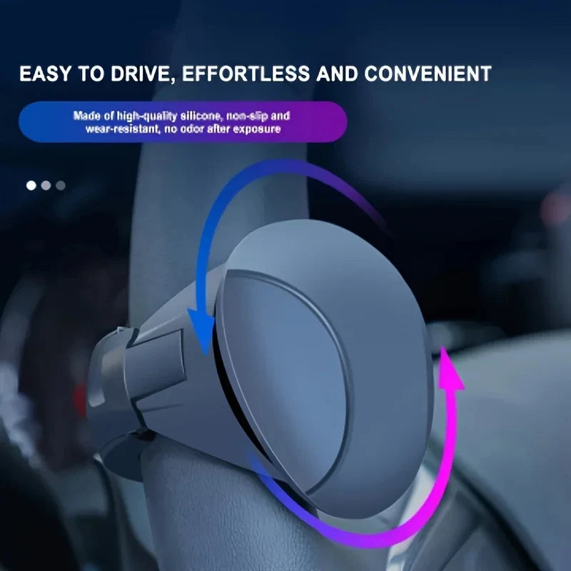 A close-up view of a gray silicone steering wheel knob designed for one-hand control.