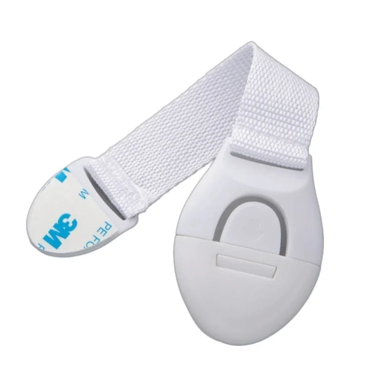 White multi-purpose baby safety straps with adjustable webbing and a clip for securing cabinets or drawers