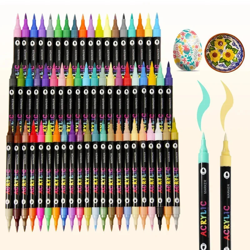 A collection of black paint markers with various colored tips and paint colors, including an egg and a floral design.