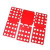 A red magic clothes folding board with multiple circular holes for organizing t-shirts.