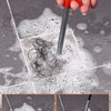 A hand holds a drain clog remover tool with a flexible wire, demonstrating the process of predredging and after dredging.