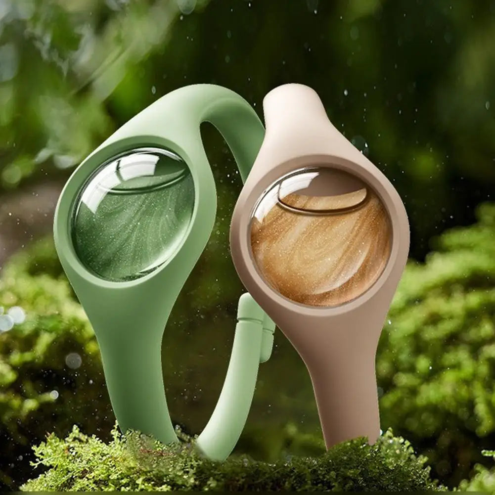 A natural mosquito repellent wristband in light green and beige colors resting on mossy greenery.