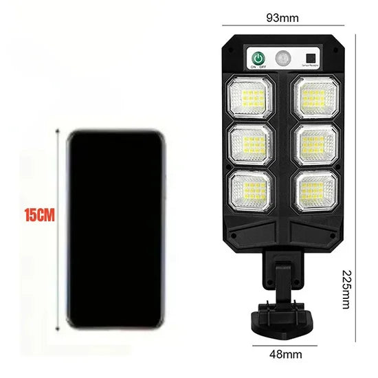 Black solar wall light with motion sensor and remote control, featuring multiple LED floodlights.