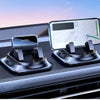 A black car phone mount with a smartphone resting on it, featuring a nano-gel base and a rotating mechanism.