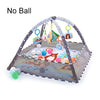 A baby play gym and activity mat with a dome shape and hanging toys is shown.
