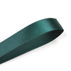 A roll of dark teal double face satin ribbon.