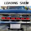 Close-up of a black Ford Bronco grille with a red lettering emblem cover installed.