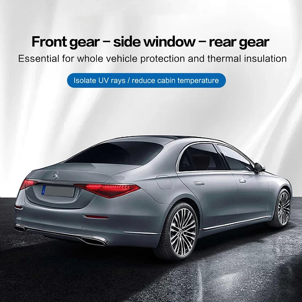 A silver sedan with tinted windows, demonstrating front, side, and rear glass protection for vehicle insulation.