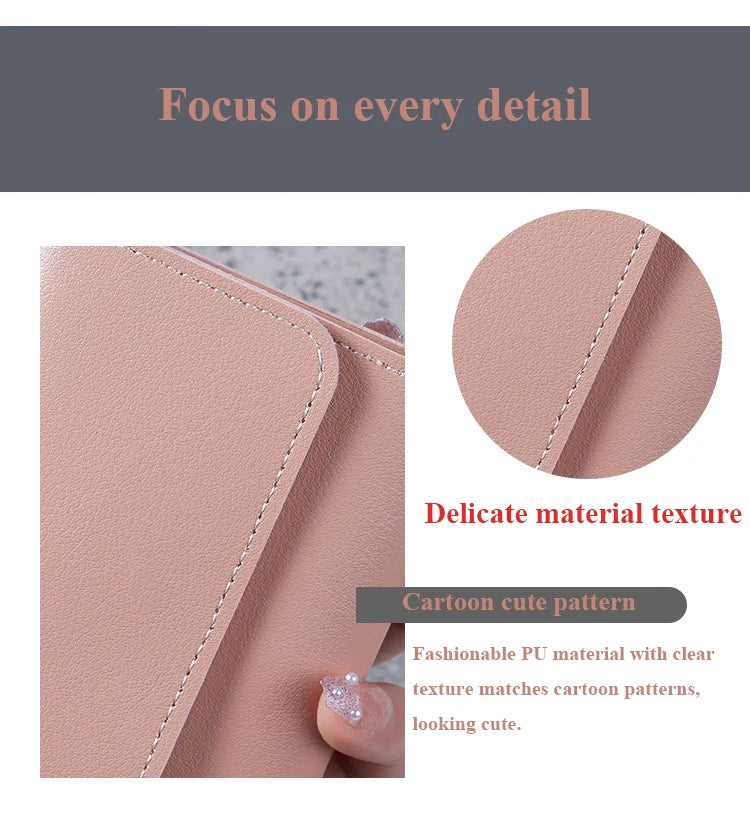 Close-up of a pink slim triple-fold PU leather wallet showing delicate texture and cartoon patterns.