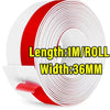 Roll of white and red self-adhesive door draft stopper for soundproofing and insulation