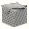 A stack of gray kitchen cleaning towels folded neatly.