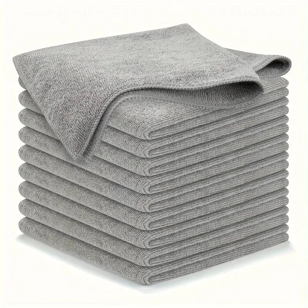 A stack of gray kitchen cleaning towels folded neatly.