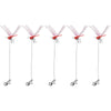 A set of lifelike dragonfly clips with pink and red wings for garden decoration.
