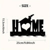 Black rustic iron wall hooks shaped like a house and heart for home organization