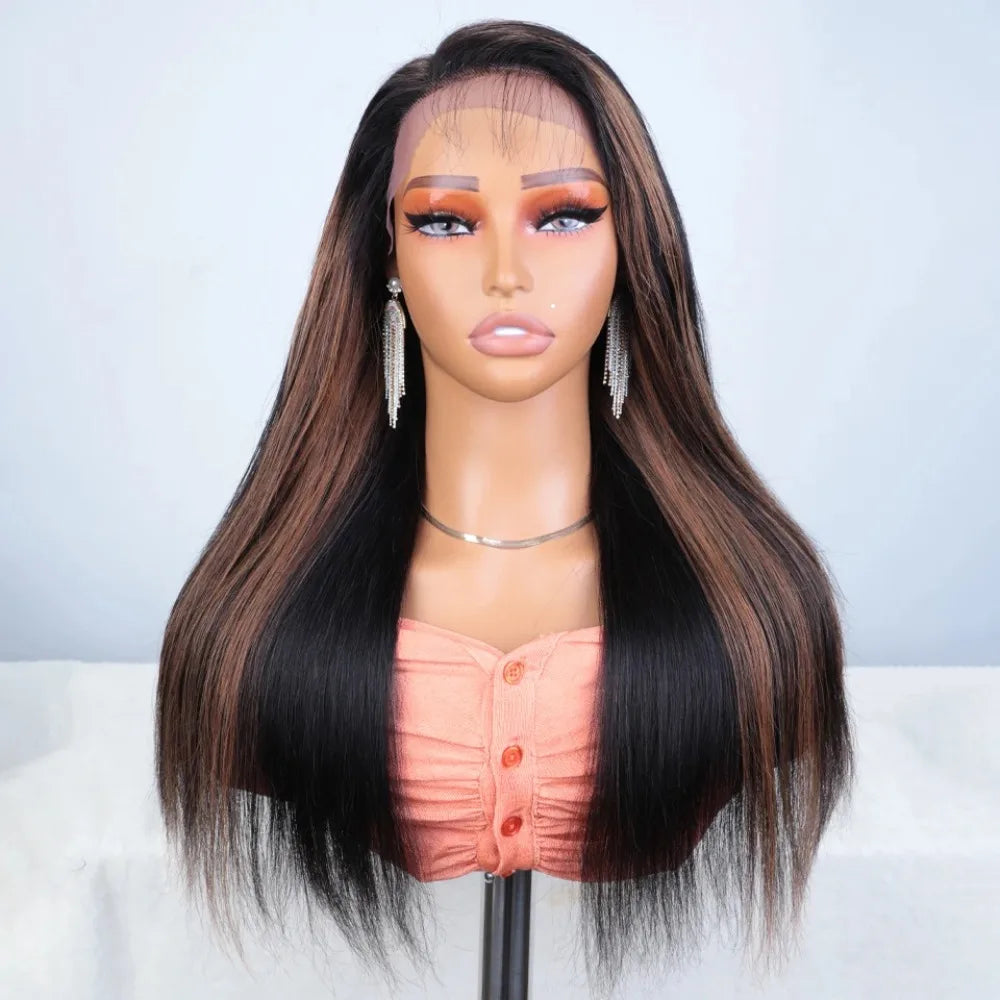 A model wearing a long, dark brown Brazilian Kinky Straight Lace Front Wig with orange-toned eyes and a peach top.