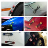 Various aluminum quick release fasteners used for securing bumpers and body panels on a car.