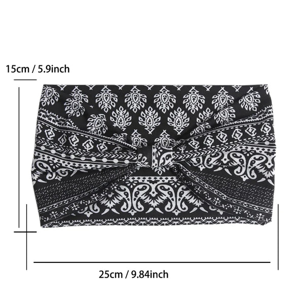 Black and white bohemian elastic headband featuring intricate paisley and geometric patterns