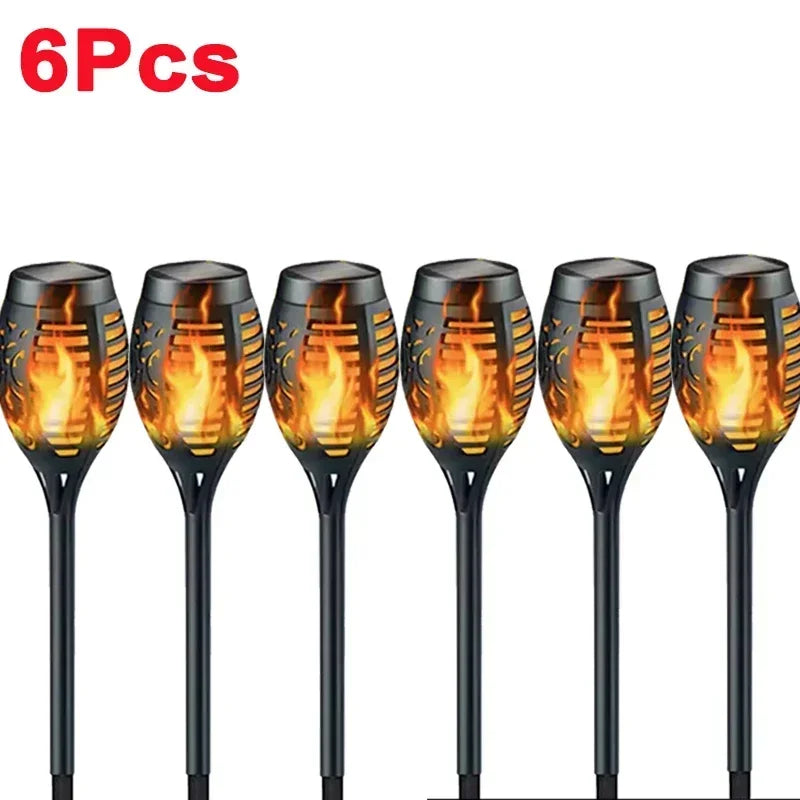 Six pieces of black solar flame torch lights for garden, patio, and pathway decoration