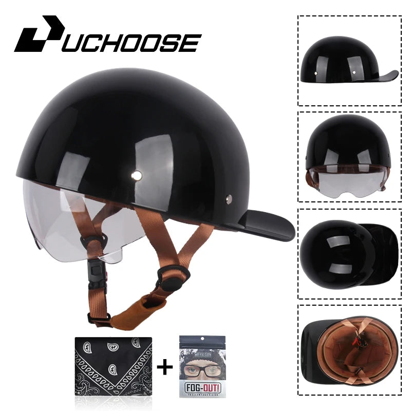 Black retro open face motorcycle helmet with a clear visor and brown strap, shown with accessories.