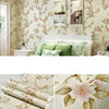 Roll of 3D embossed floral self-adhesive wallpaper featuring pink and green foliage patterns