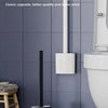 A wall-mounted toilet brush set with a black handle and white base is shown next to a toilet.