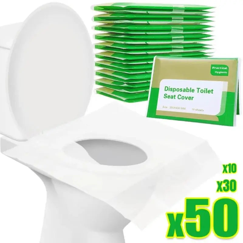 A stack of green disposable toilet seat covers next to a white toilet seat cover.