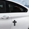 A close-up of a white car door showing a black cross emblem on the side panel.