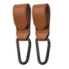 A pair of brown PU leather stroller hooks with black swivel clasps.