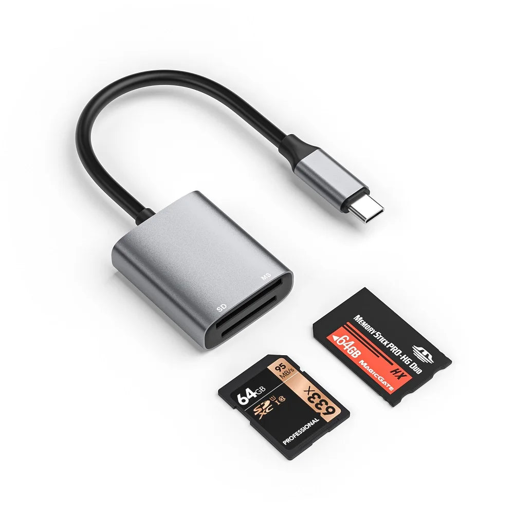 A silver dual-slot card reader with a black cable and two memory stick cards on a white background.