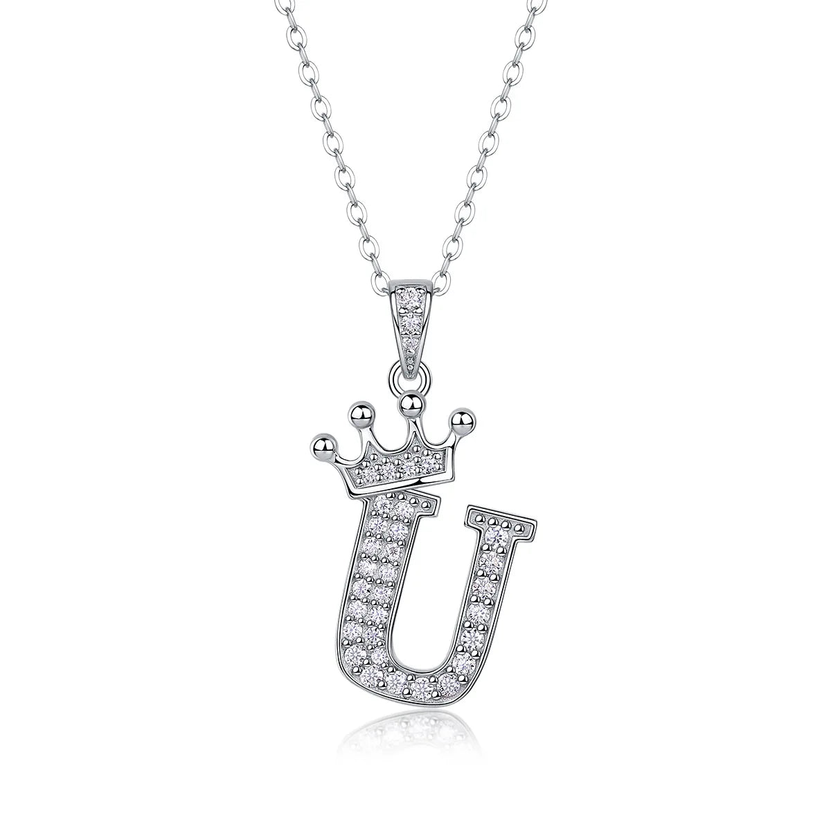 A sterling silver moissanite letter U pendant necklace with a crown design.