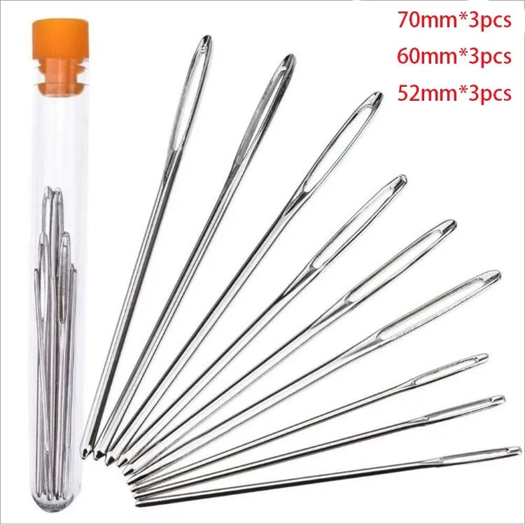 A set of large eye sewing needles in various sizes (70mm, 60mm, and 52mm) packaged in clear tubes.