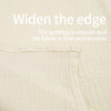 Close-up of a light beige breathable cotton muslin car seat and stroller cover fabric with visible stitching.