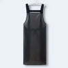 Black waterproof oil-proof kitchen apron hanging on a hanger
