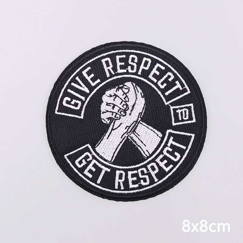 Black embroidered patch with white text that reads Give Respect to Get Respect