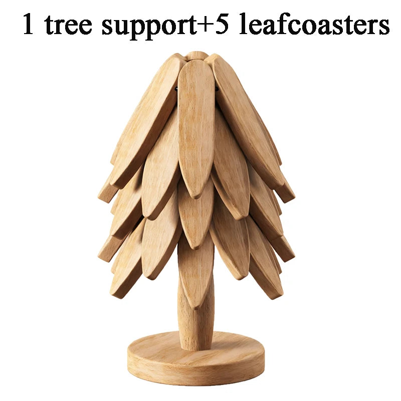 A wooden tree design coaster set featuring one tree support and five leaf coasters.