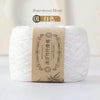 A ball of white bamboo fiber yarn labeled as color 01 for knitting and crochet projects.