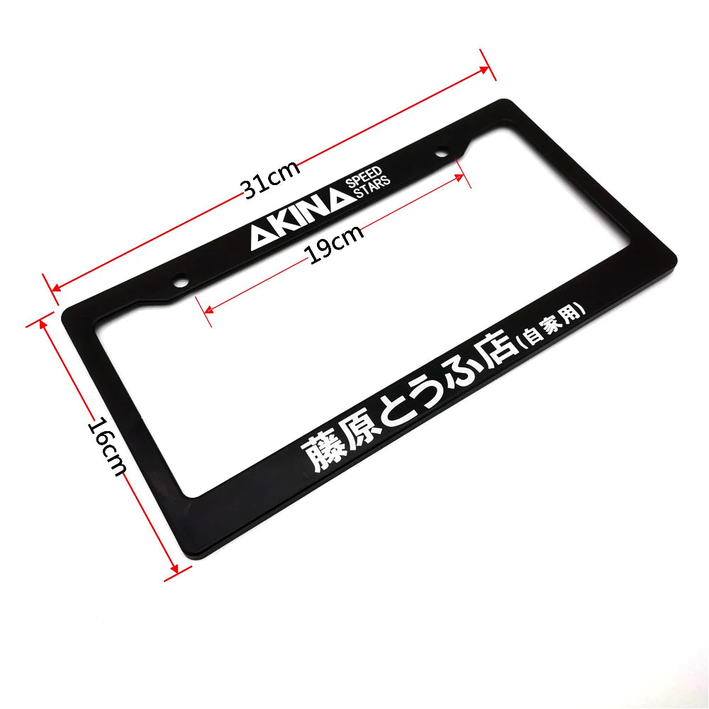 Black racing style license plate frame with dimensions 31cm by 19cm