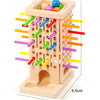 A light peach pick-up sticks board game featuring colorful wooden sticks and balls.