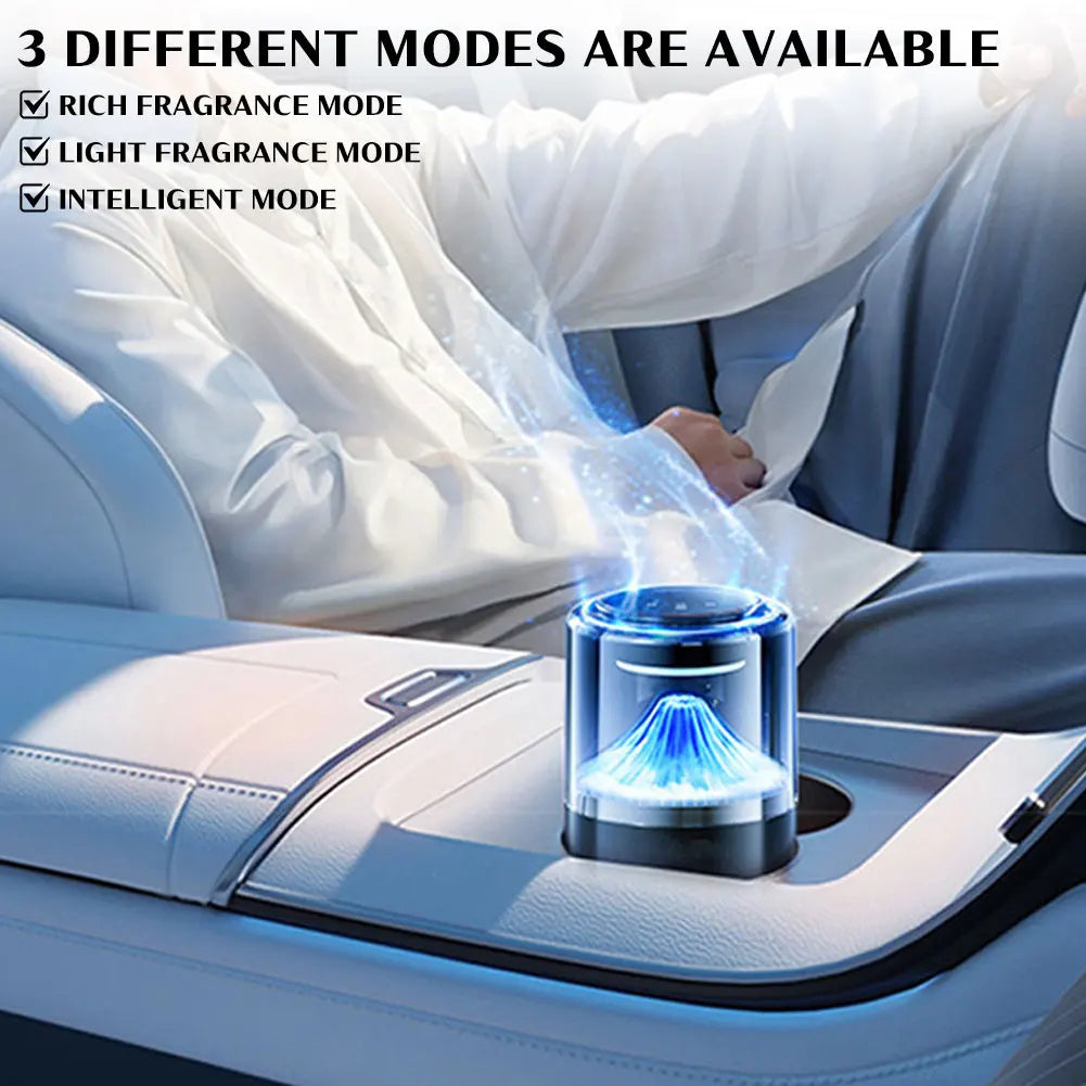 A smart car diffuser emitting blue ambient light and mist, with options for rich, light fragrance modes.
